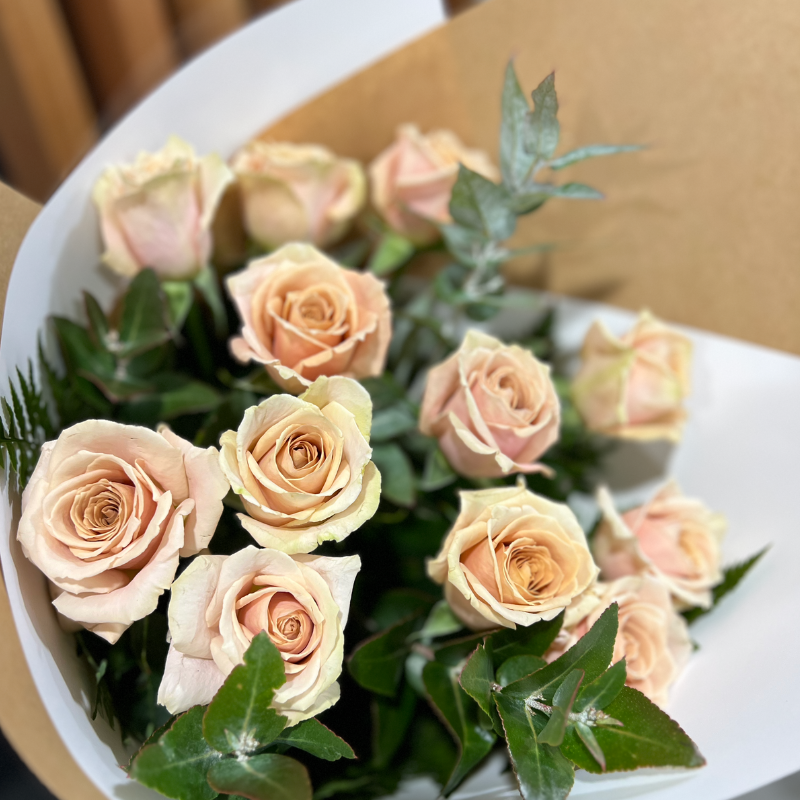 12 Cream roses with foliage