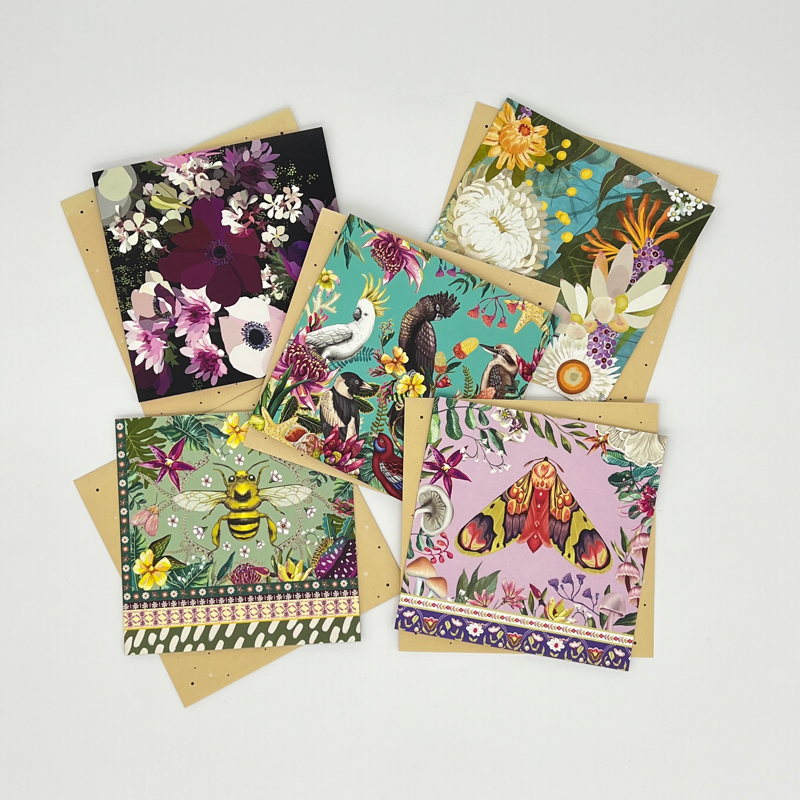 Colorful La La Land greeting cards with floral and nature-themed designs.