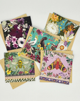 Colorful La La Land greeting cards with floral and nature-themed designs.
