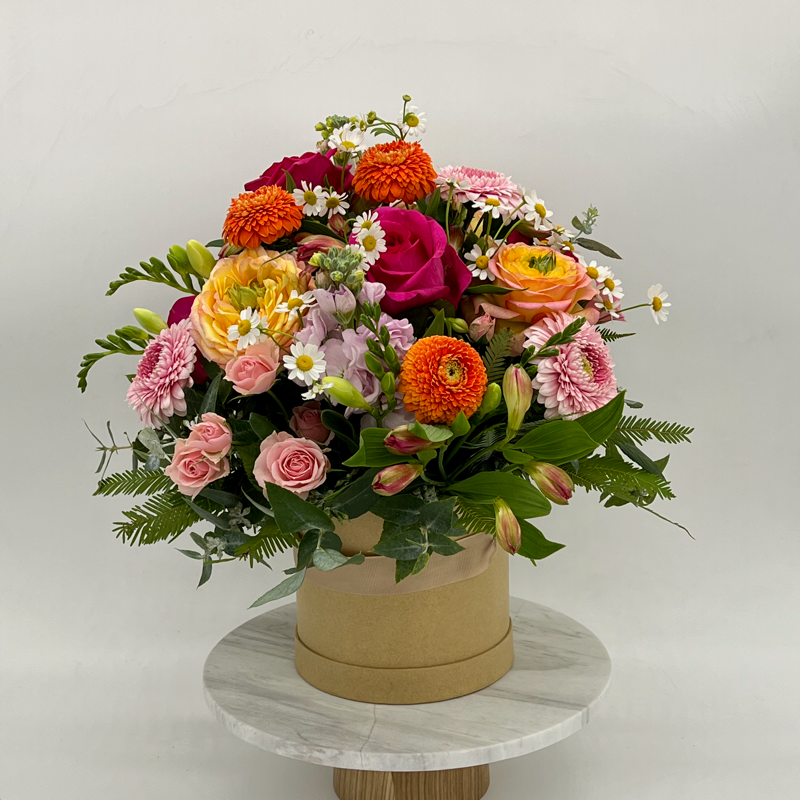 Medium Hat Box of Mixed Seasonal Flowers Bright Coloured Flowers