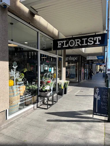 The Tamar Valley Rose Shop with flowers displayed outside on St John St Launceston